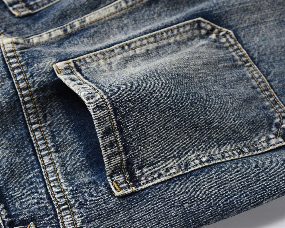 Men's blue denim punk loose straight trousers flat lay