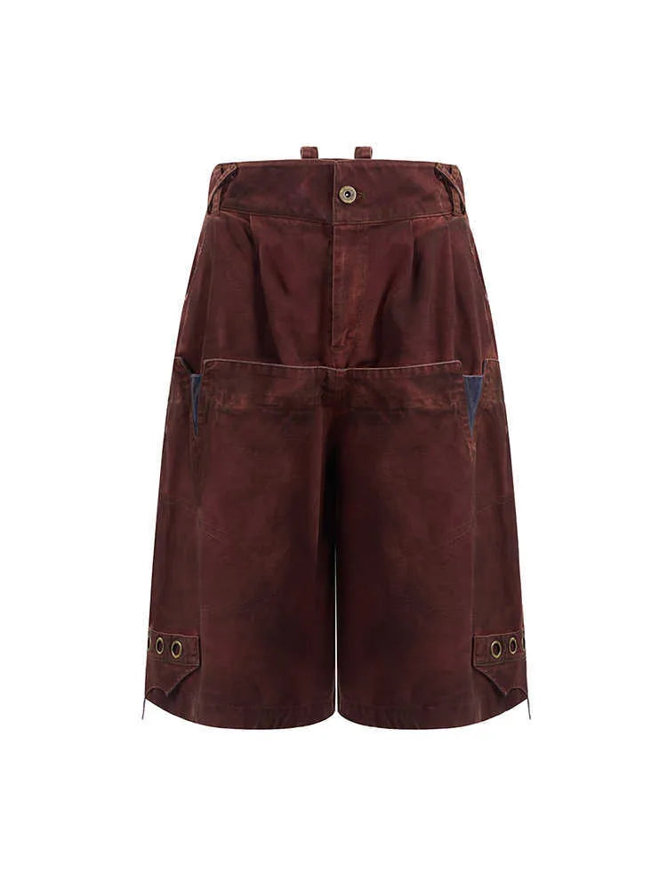 Men's black loose cropped trousers showing double waistband and washed stitching detail