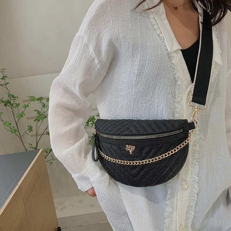 Women's one-shoulder chain crossbody bag in white PU with sandwich pocket and zipper change bag on a model