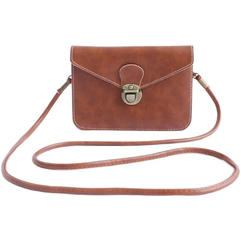 Retro shoulder messenger bag in wine red with flap closure and crossbody strap