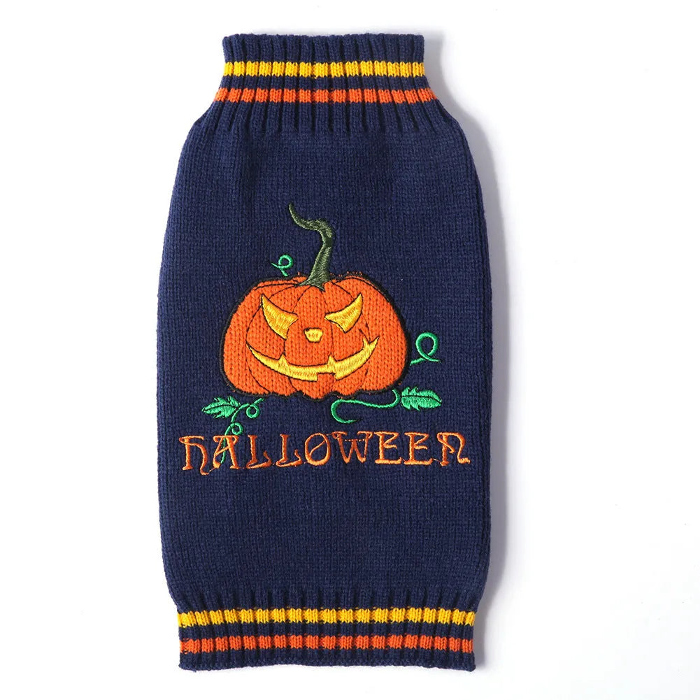 Knitted pumpkin dog sweater in orange black colour on a small dog, shown with measured sizing from XXS to 2XL