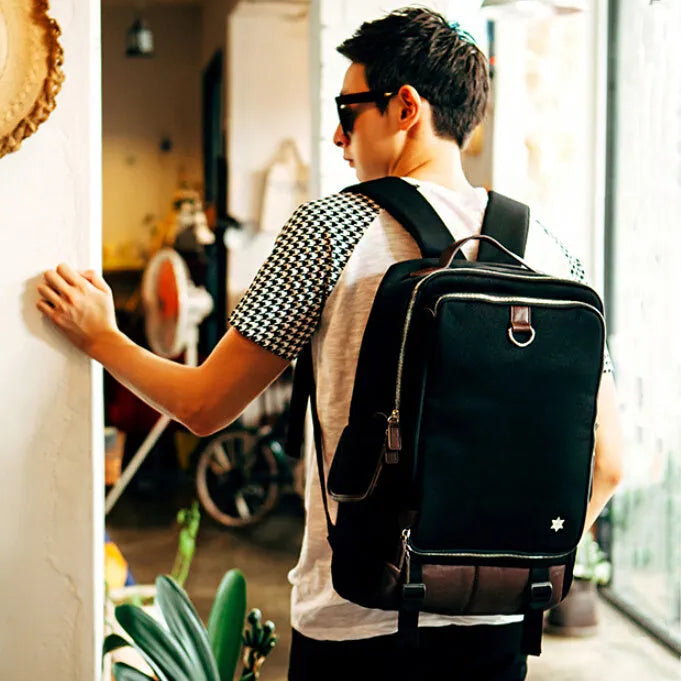 Modern men's large capacity Oxford cloth backpack in army green colour, dimensions 30x16x46cm.