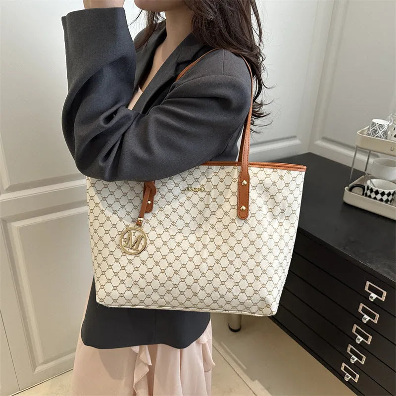 Women's structured PU leather shoulder bag in street-trend style with sewing thread detail.