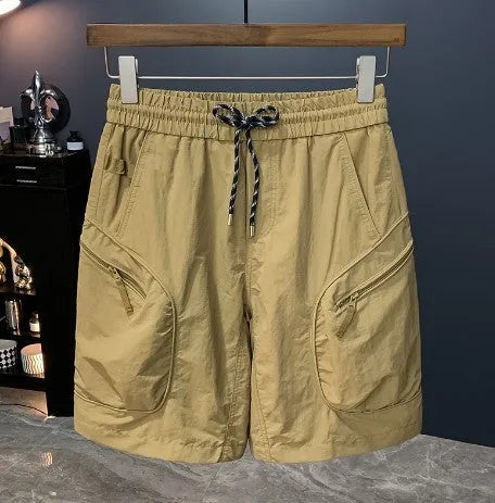 Man wearing loose-fit camouflage cargo shorts made from quick-dry cotton blend fabric