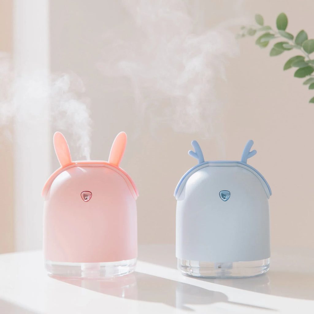 Micron atomisation smart humidifier in purple and yellow, 91mm tall, with USB cable showing timer controls