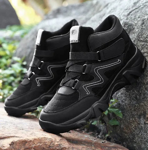 Men's classic black lace-up shoes with a rubber sole on a white background.