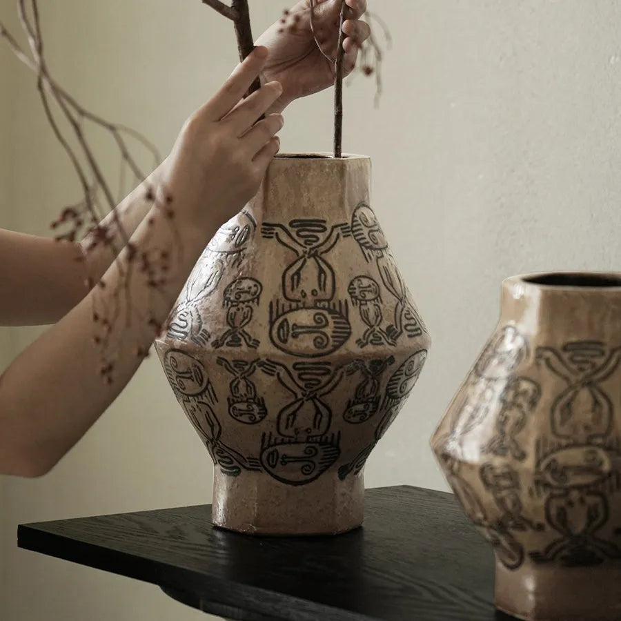 Ceramic cylindrical vase with hand-painted vintage carved tribal totem artwork