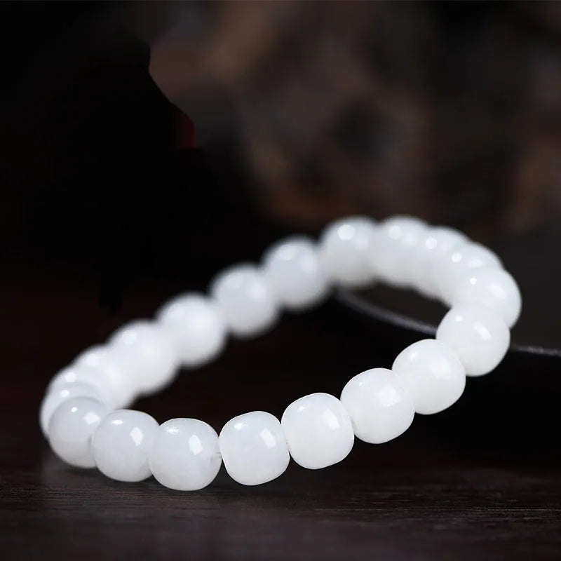 White jade barrel beads bracelet on wrist, Hetian jade, unisex casual style