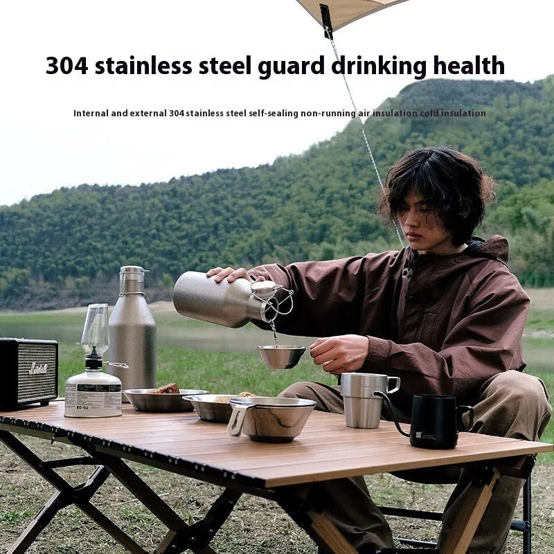 Large stainless steel outdoor thermal pot with handle for portable use during camping and picnics