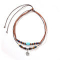 Wooden bead necklace with alloy floral pendant and turquoise wax rope in retro design