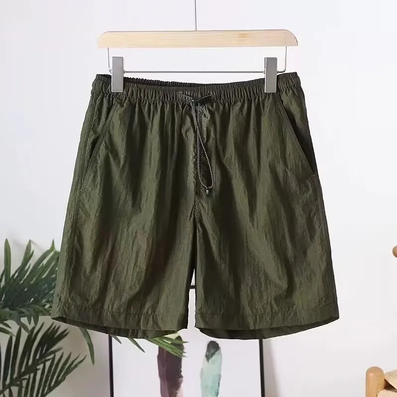 Men's straight cut polyester sports shorts in army green, black, blue, or gray colours