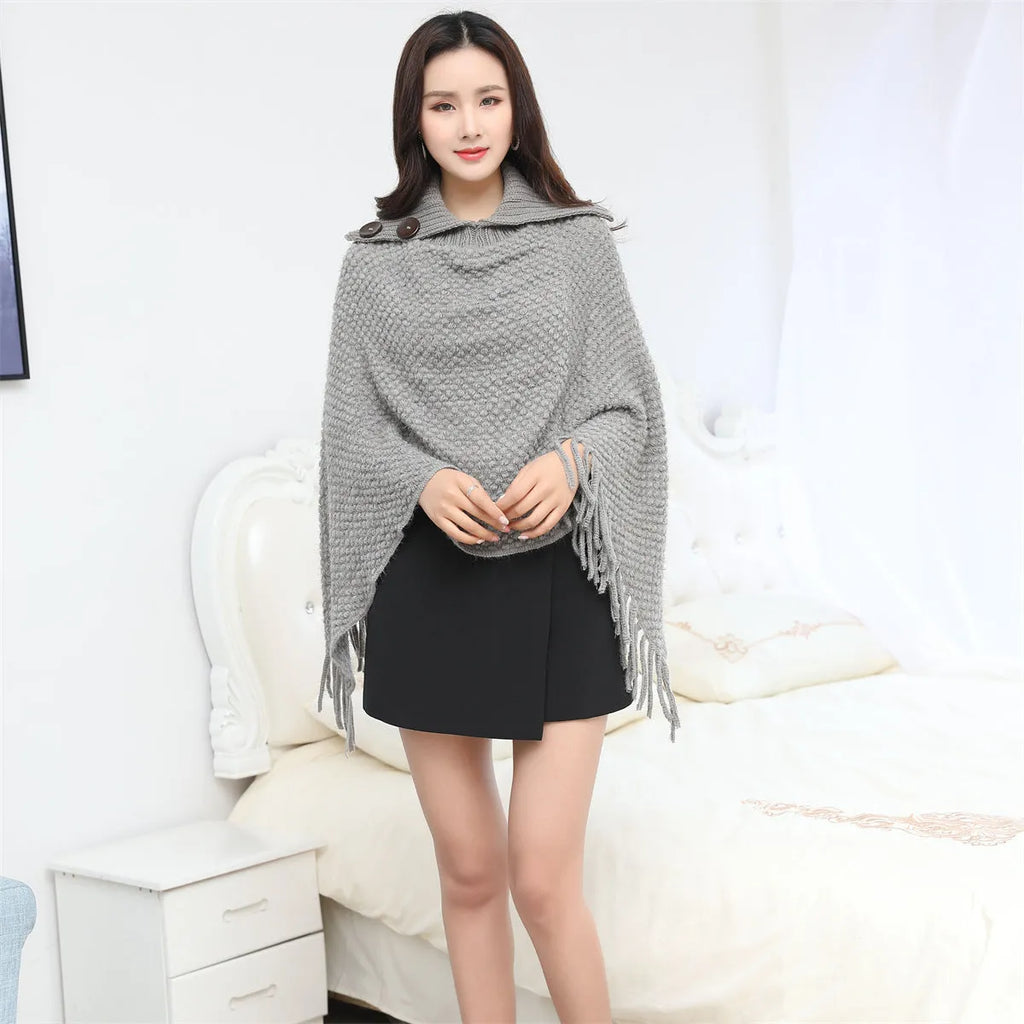 Women's knitted polka dot shawl cloak in sleeveless cape design showing colour options