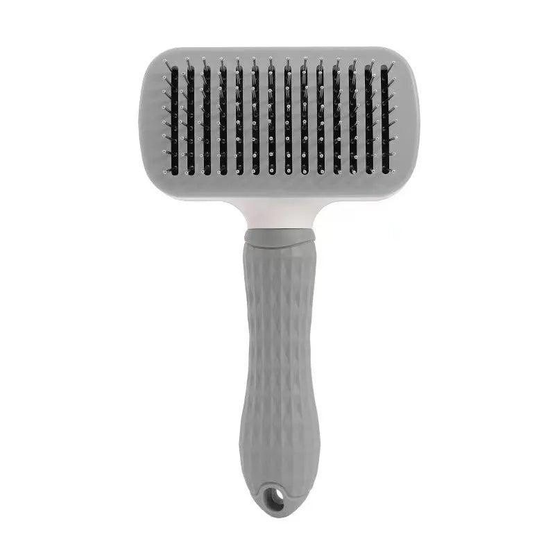 Blue self-cleaning pet comb with fine stainless steel teeth and rubber body on white background