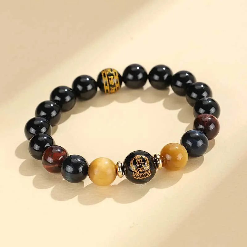 Handmade black agate beaded bracelet with Buddhist carving and tiger eye gemstones