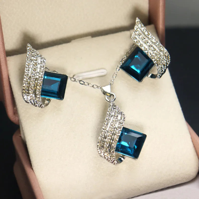 Glass pendant necklace and matching ear stud set with electroplated finish and cross chain style for women