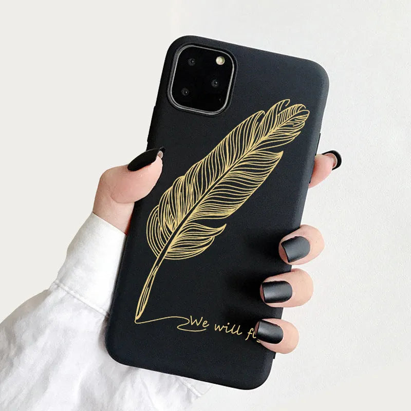 Frosted TPU iPhone case showing painted 'LOVE' letter design on a pink background.