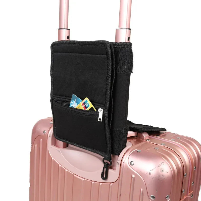 Black canvas folding travel tote bag with shoulder strap for packing and shopping