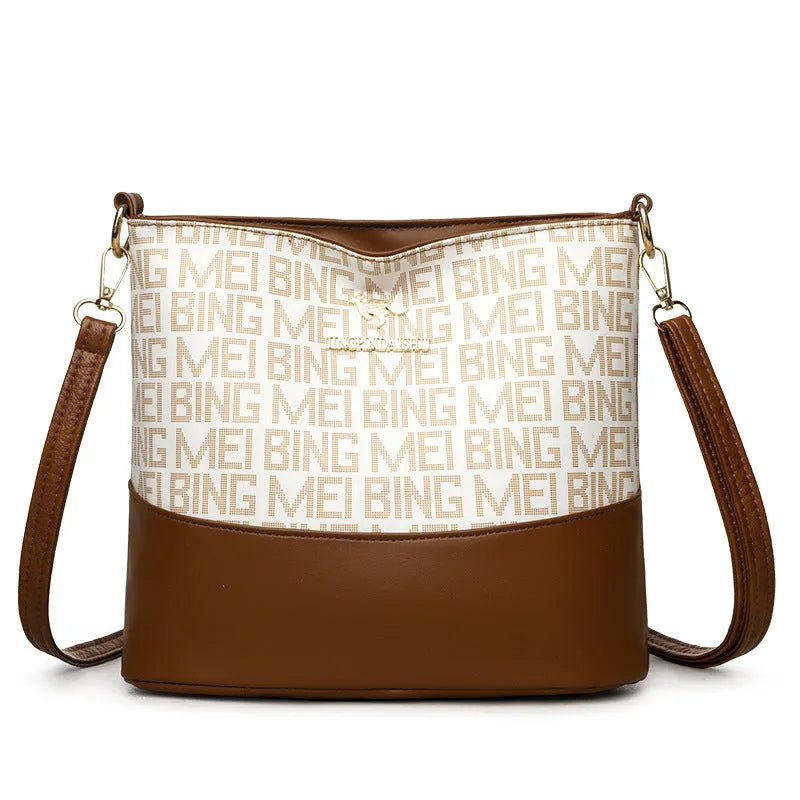 Brown soft PU leather messenger bag with organisation compartments and urban simplicity design