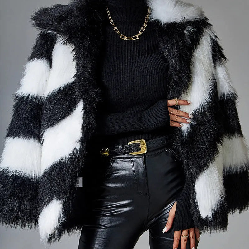 Women's faux fur coat with contrast colour lapels and a removable fur collar.
