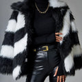 Women's faux fur coat with contrast colour lapels and a removable fur collar.