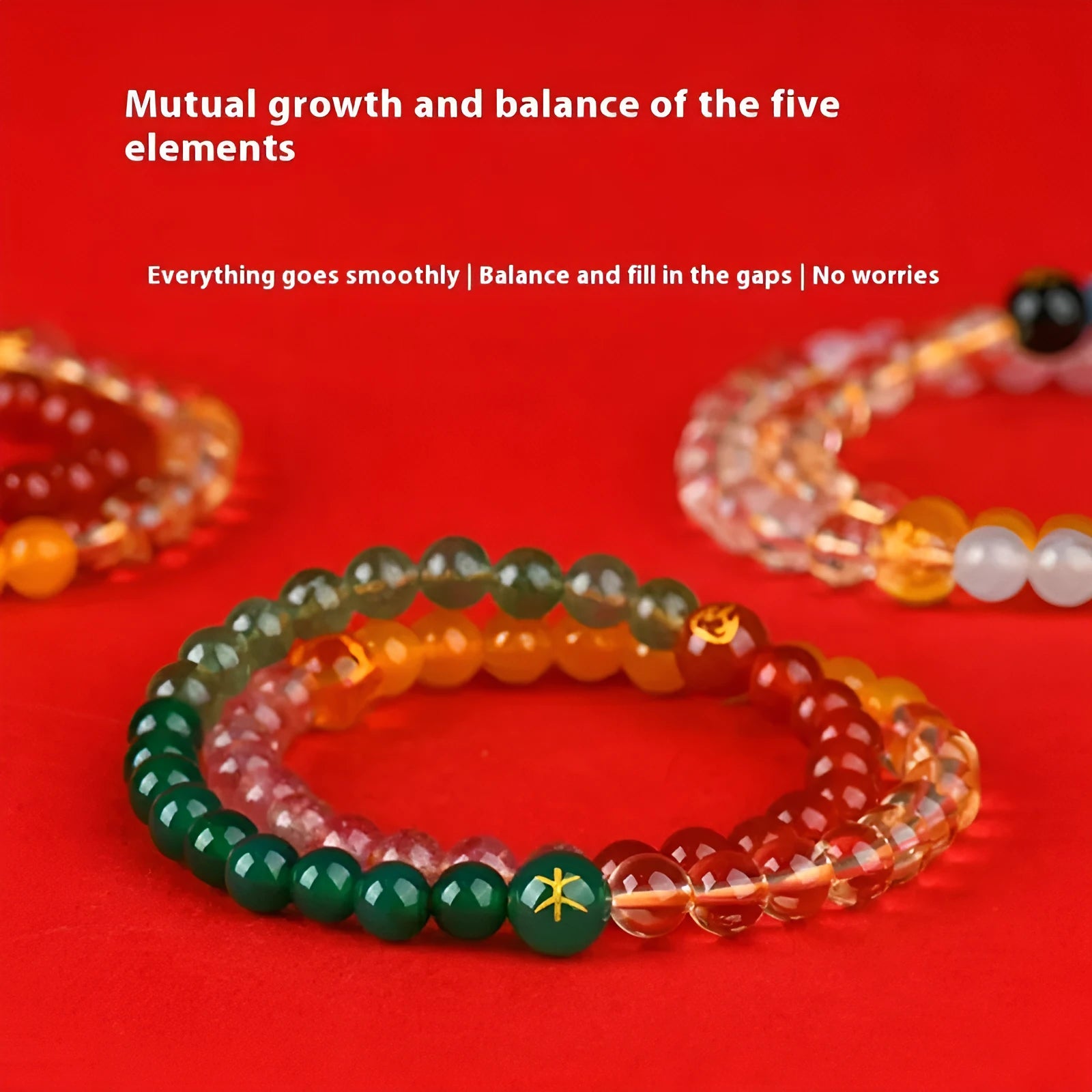 Handmade women's crystal double ring bracelet in five elements colours on a wrist.