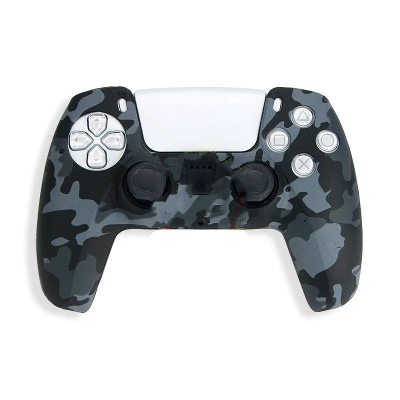 Camouflage patterned silicone grip case fitted on a black Sony PS5 DualSense controller.