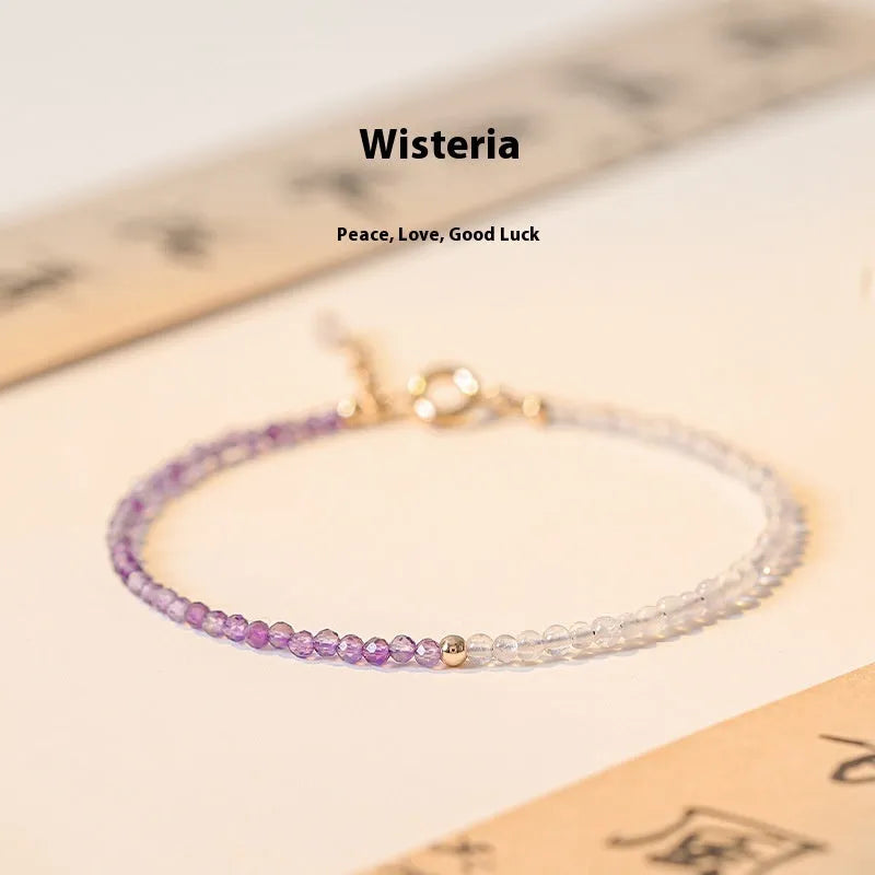 Close-up of a purple geometric rattan crystal bracelet with 2mm thickness and cut facets.