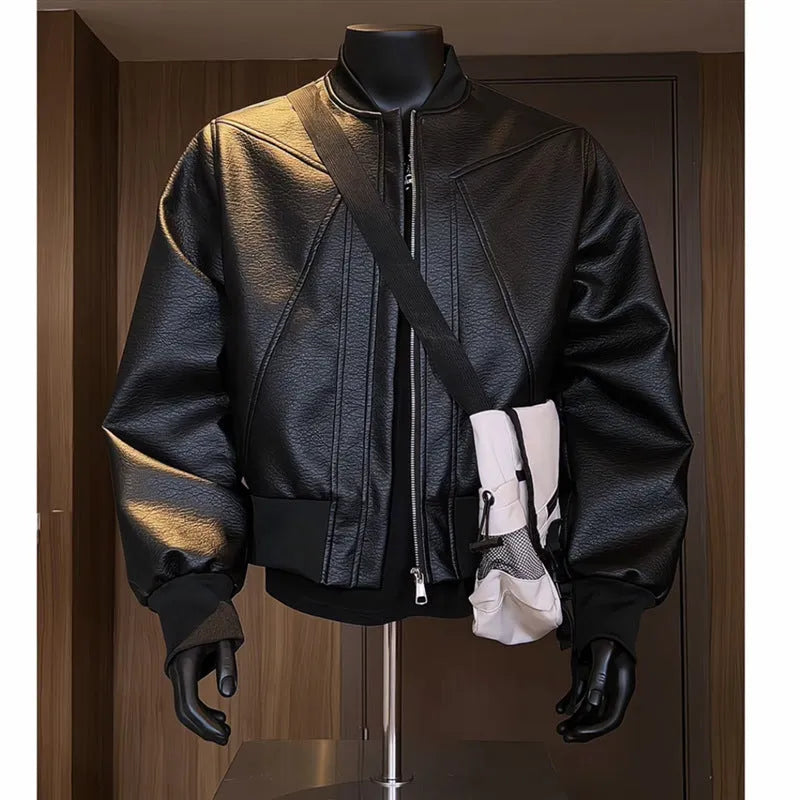 Men's black fitted PU leather jacket with litchi grain texture and 100cm extended length.