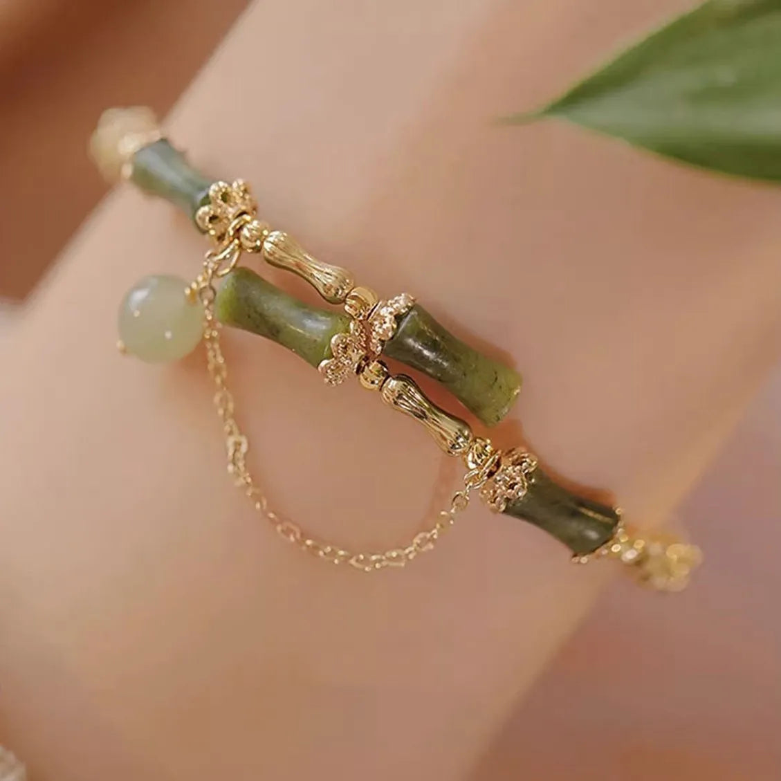Women's bamboo bracelet with plum wine bamboo joints and coloured glaze beads on adjustable elastic cord