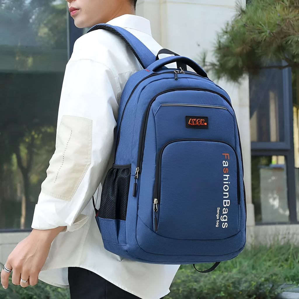 Large capacity black nylon travel backpack with multiple internal compartments and double shoulder straps.