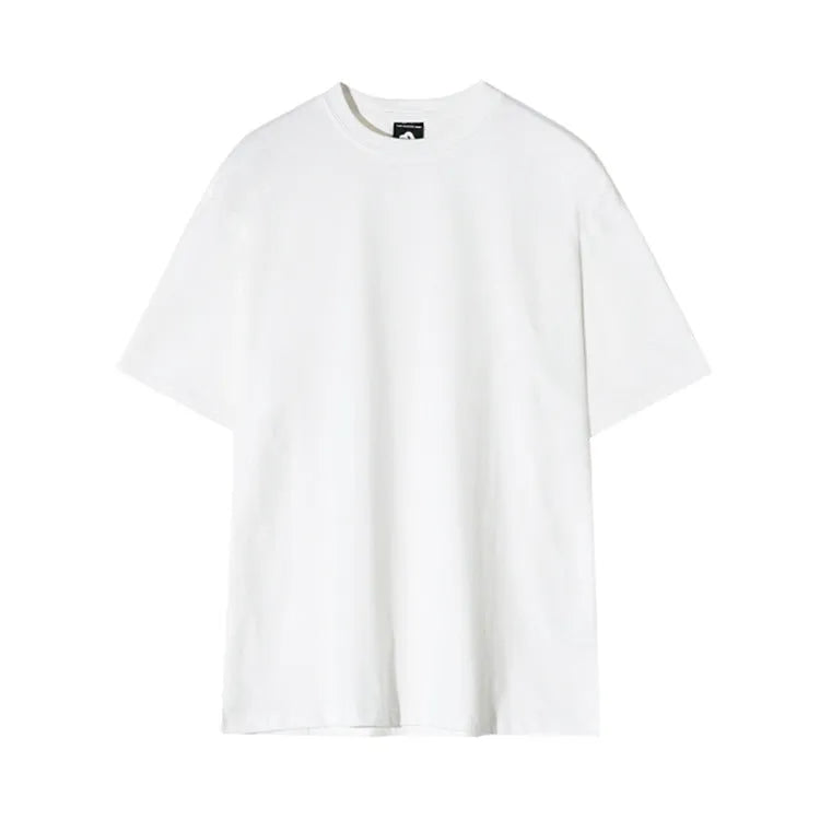Slim fit men's cotton T-shirt in black on a white background, showing round neck and short sleeves.