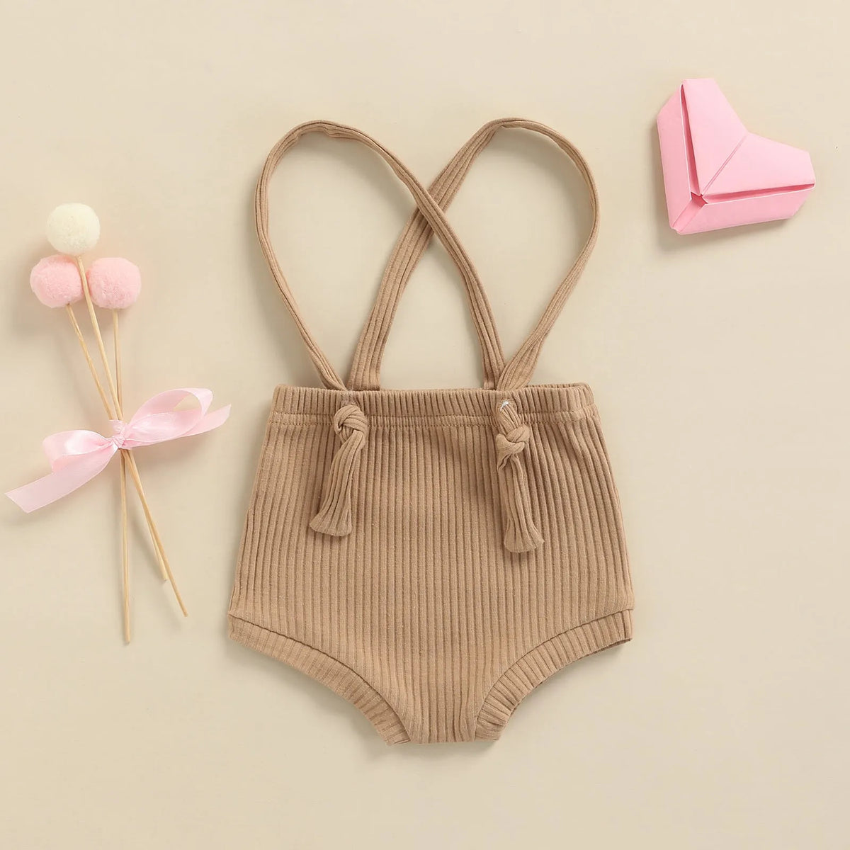 Baby carrier high waist triangle bottoming stretch pants in cotton solid colour on a model infant