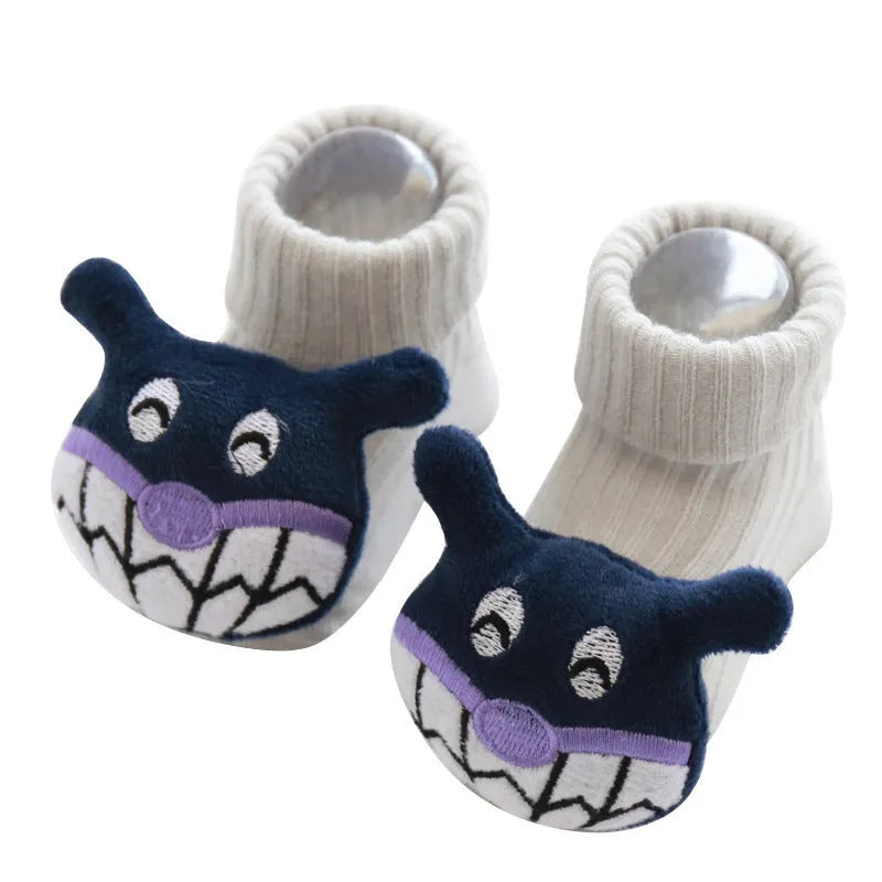 Cotton baby floor socks in multiple designs including panda, bow, and star patterns.