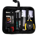 Black plastic case open to show guitar repair and maintenance tools for guitars, basses, mandolins, and banjos.