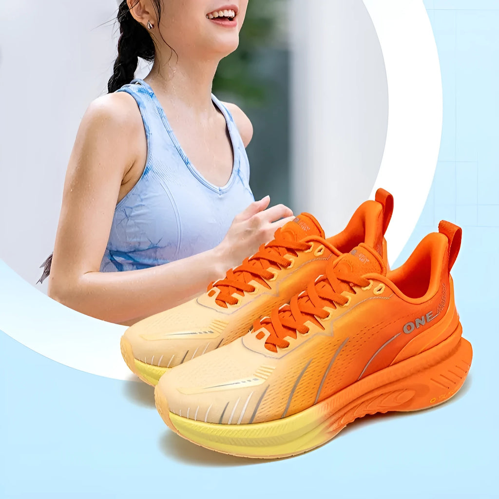 Low top running shoes in PU mesh with embroidery detail, shown in a red colourway on a rubber sole.