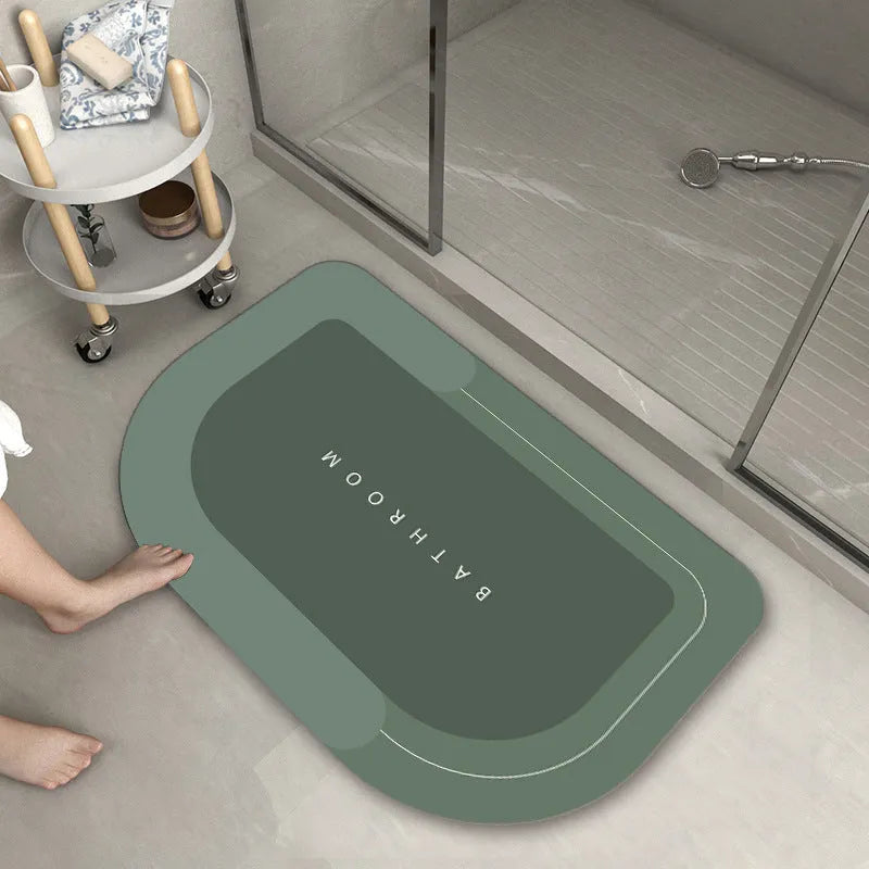 Blended fabric bathroom floor mat in blue, available in oval and rectangular shapes.