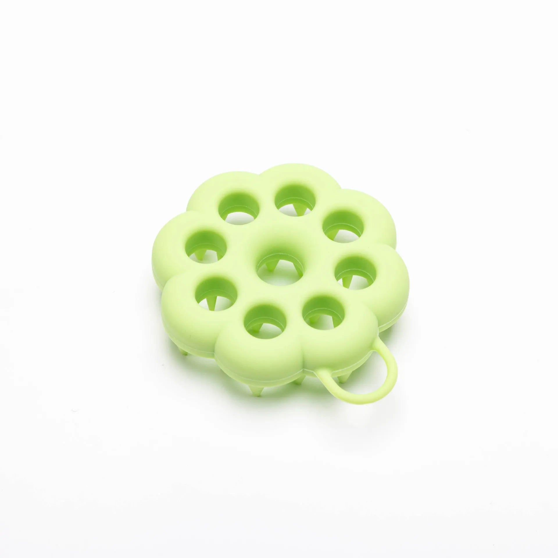 Blue silicone pet grooming brush with soft bristles and an ergonomic massage handle on a white background.