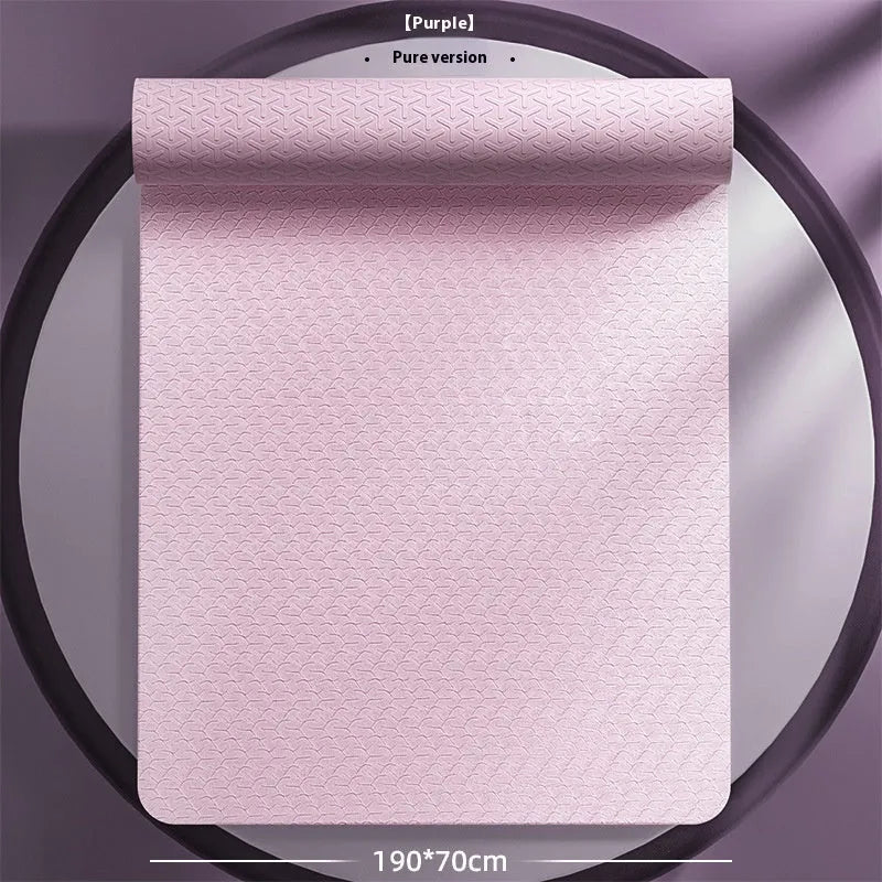 TPE non-slip fitness training mat in mint green colour, showing widened 190cm by 70cm dimensions rolled out on a floor.