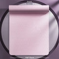 TPE non-slip fitness training mat in mint green colour, showing widened 190cm by 70cm dimensions rolled out on a floor.