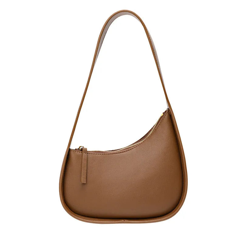 Genuine leather ladies shoulder bag with half moon design and wide strap