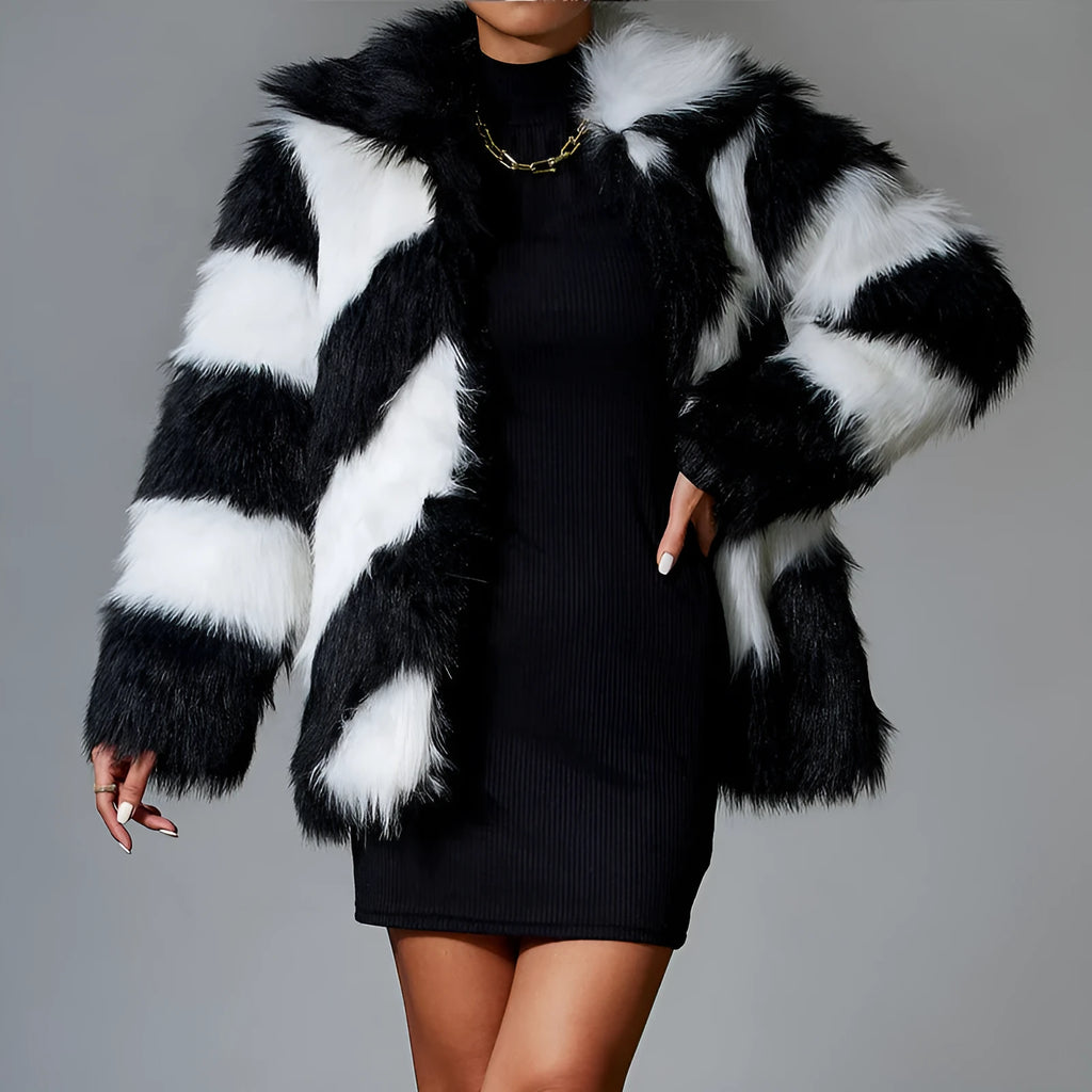 Women's faux fur coat with contrast colour lapels and a removable fur collar.