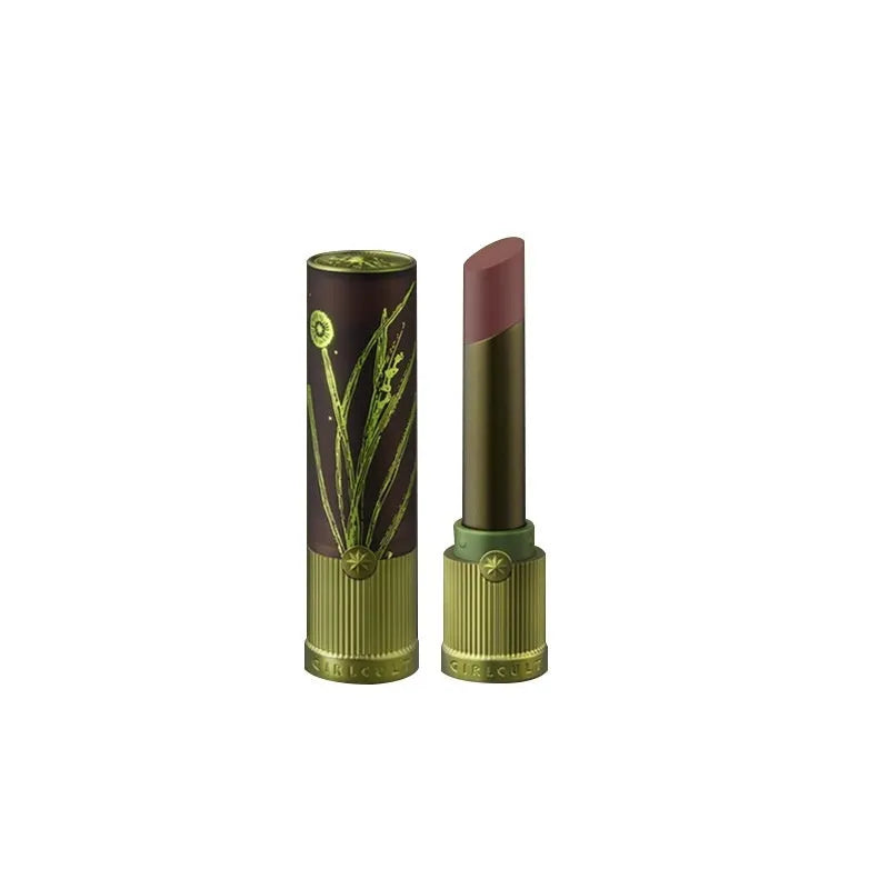 Matte brown lip mud in tube with applicator wand, low-saturation nude earth tone colour