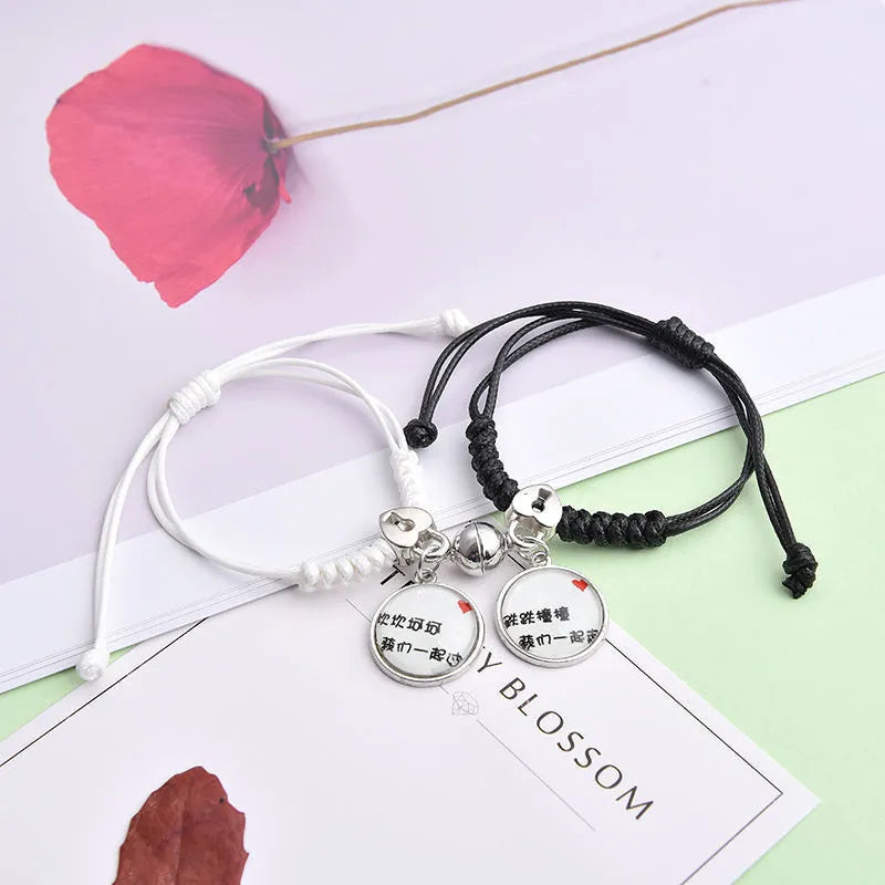 Magnet couple bracelets with electroplated finish showing magnetic clasp and symbolic design options
