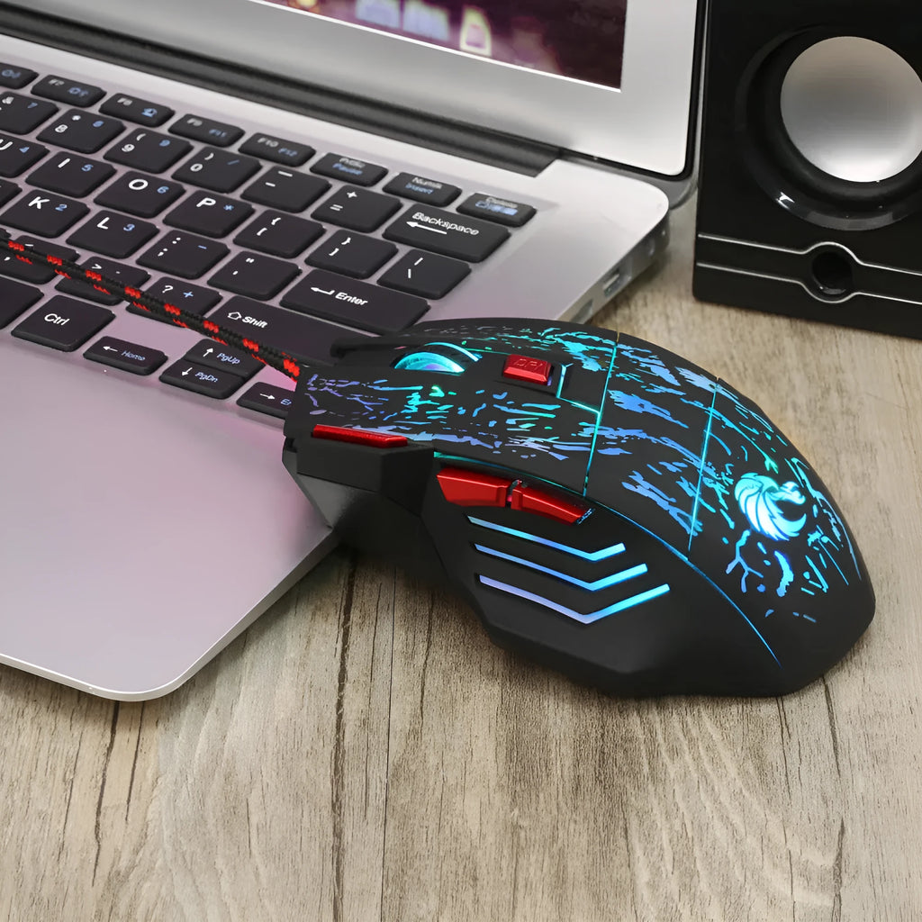 Water crack colourful luminous gaming mouse with USB cable on desktop