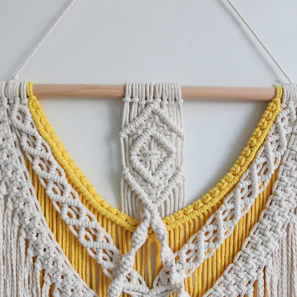 Hand-woven creamy-white cotton Nordic tapestry with yellow accents, 120cm by 95cm rectangular wall hanging.