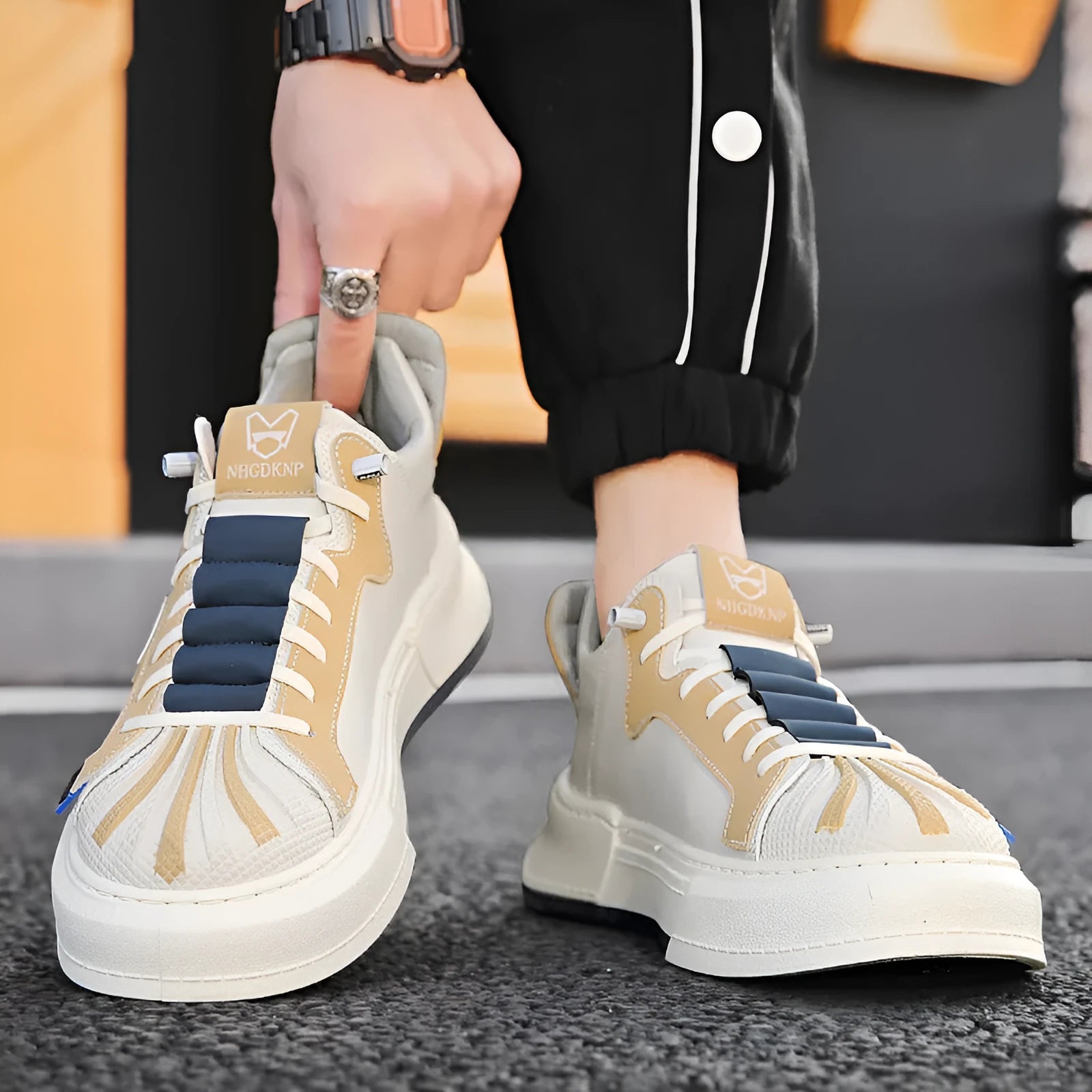 Men's beige and black casual sneakers with mesh lining and elastic band closure