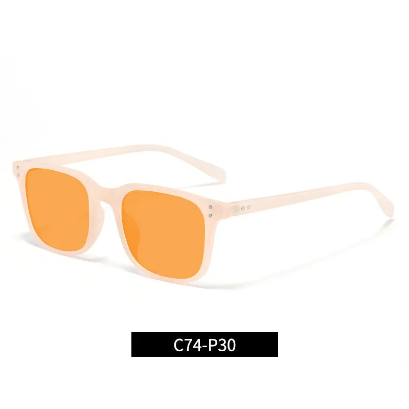 Colour-changing orange lens anti-blue light glasses with a TR90 frame on a colour box.