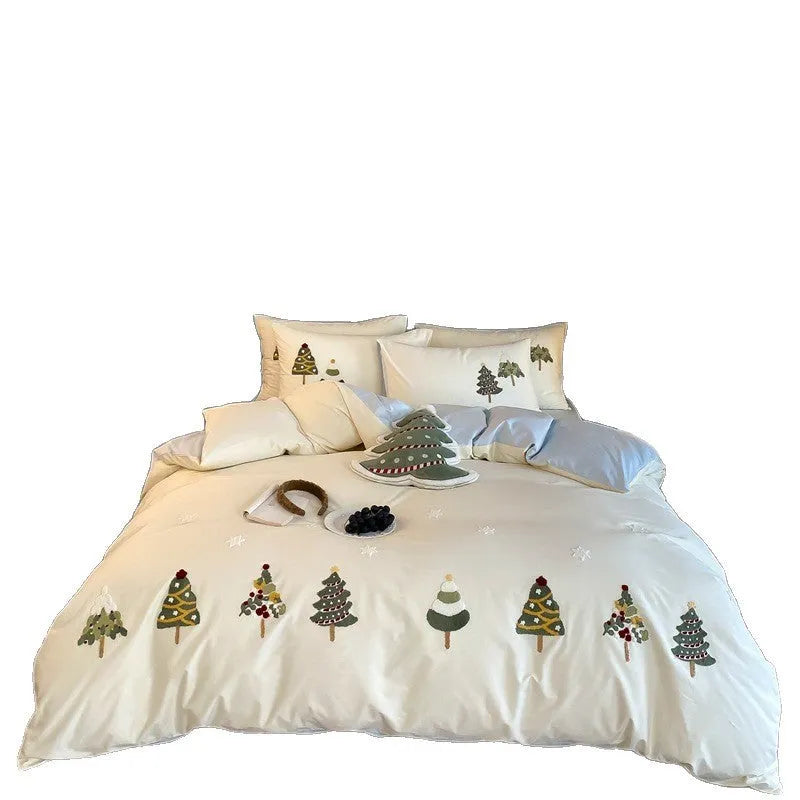 Pure cotton four-piece bed set with embroidered Christmas tree pattern in cream blue and green colours.