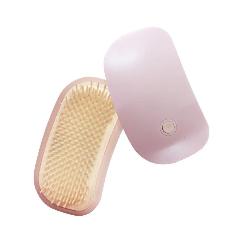 Pink electric pet massage brush with TPE teeth for cats and dogs