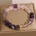 Women's purple amethyst crystal bracelet with rhinestone details measuring 10mm